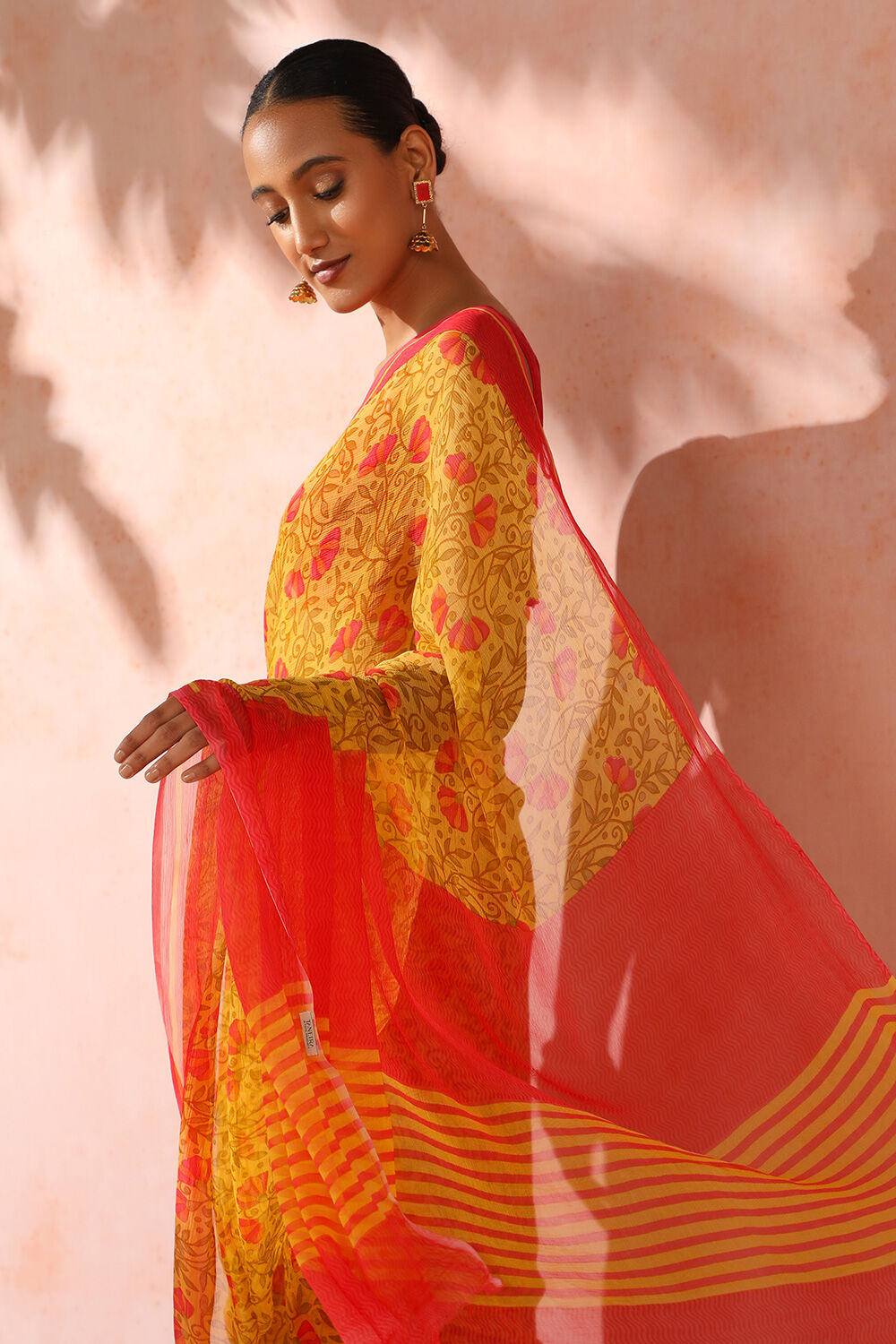 Buy Party Wear Yellow Brasso Chiffon Saree Online From Surat Wholesale Shop.