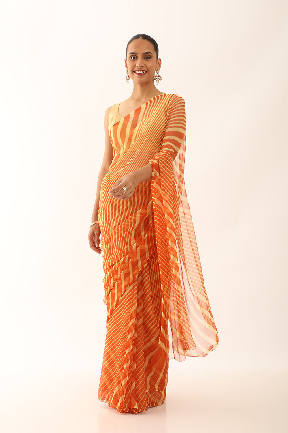 Queen of Hearts by Deepa Mehta - Terracotta Leheriya Khadi Cotton Saree Buy  now: https://www.qohindia.com/collections/leheriya-sarees /products/terracotta-leheriya-khadi-cotton-saree Handspun Khadi Sarees  tie/dyed in Rajasthan in a piquant riot of ...