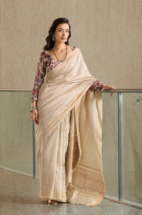Ivory White Banarasi Brocade Saree with Patterned Blouse & Gold Details -  Seasons India
